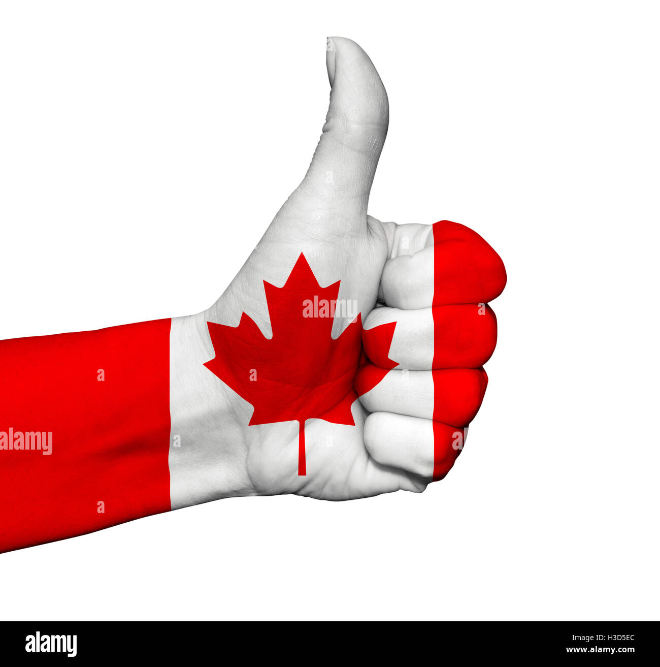 Hand with thumb up painted in colors of Canada flag isolated Stock Photo