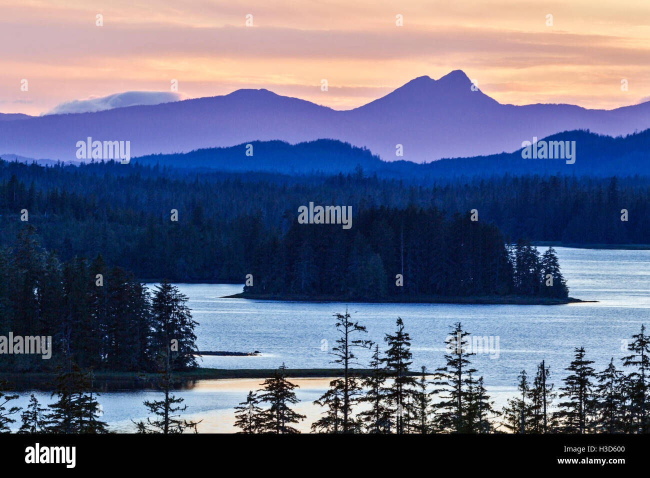 Sunset over the mountainous coastal rainforest of the Tongass National Forest in Southeast Alaska, USA Stock Photo