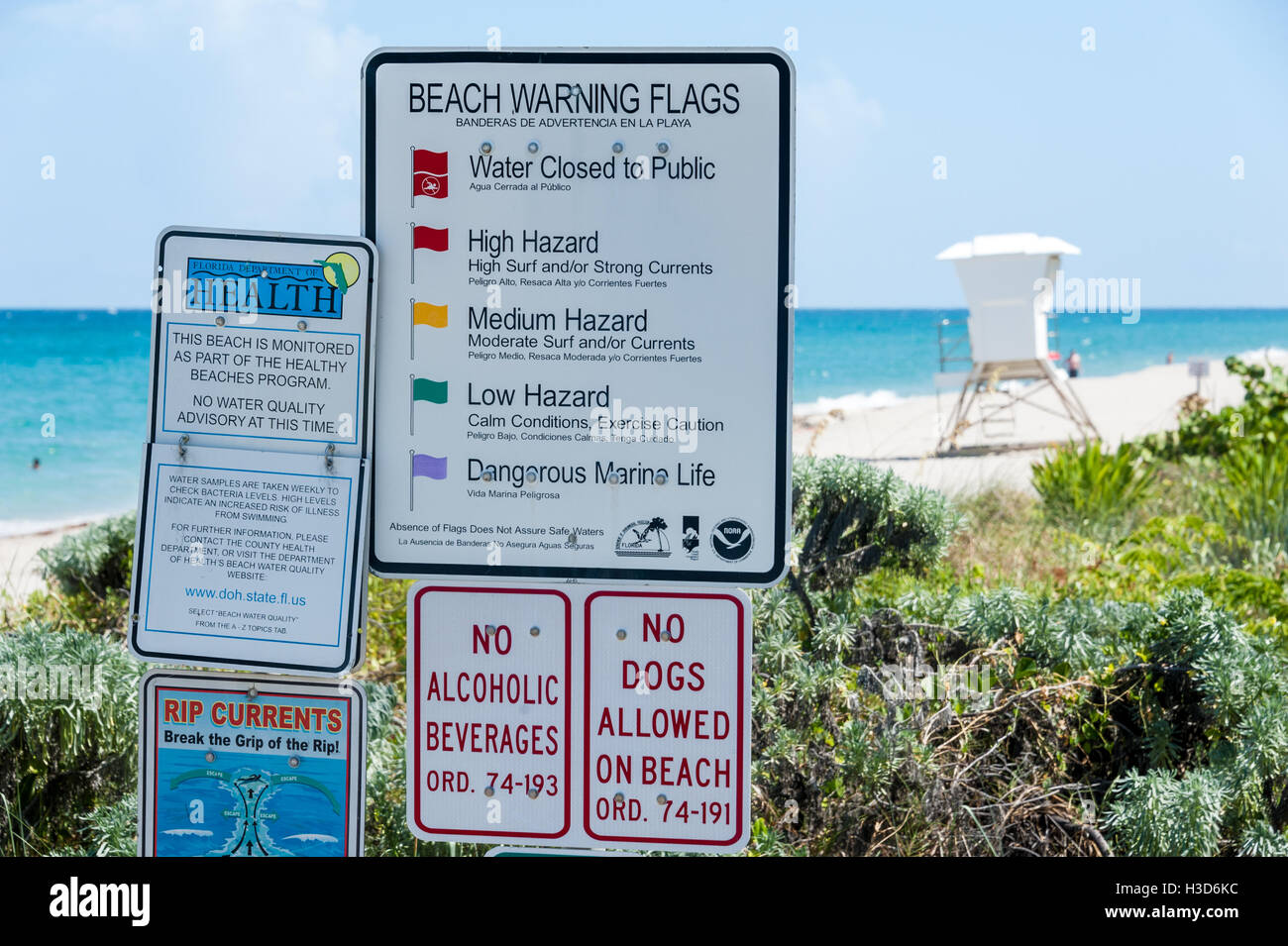 Beach warning, health and ordinance signs at the public beach in Palm