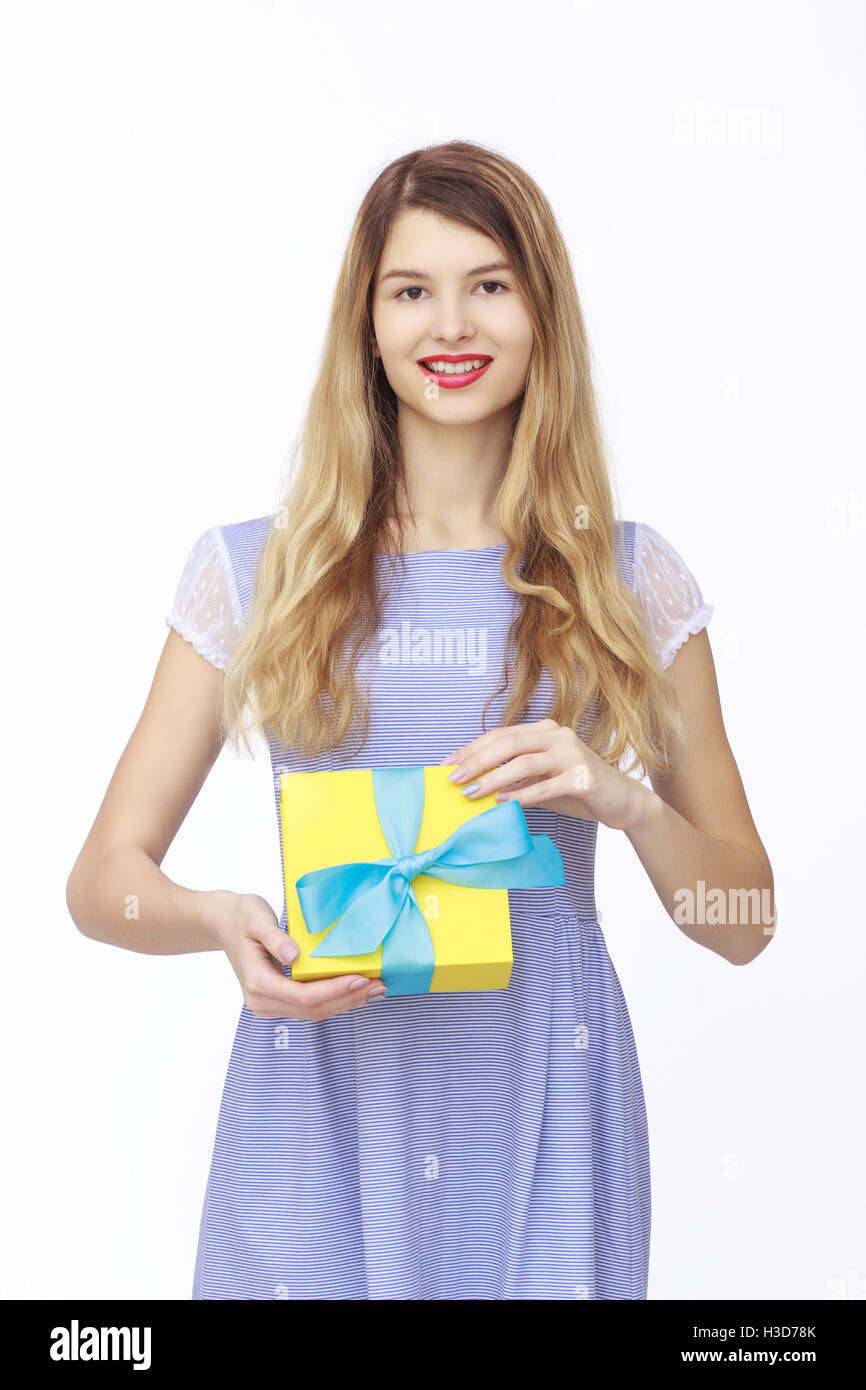 Young woman portrait holding gift Stock Photo - Alamy
