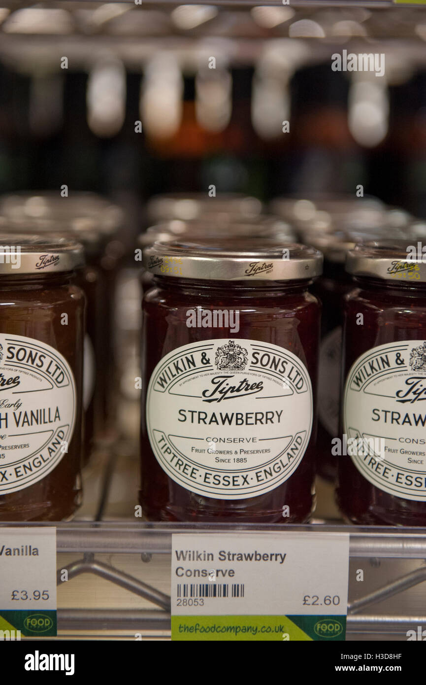 Jam jars on a shelf in a grocery store Stock Photo Alamy
