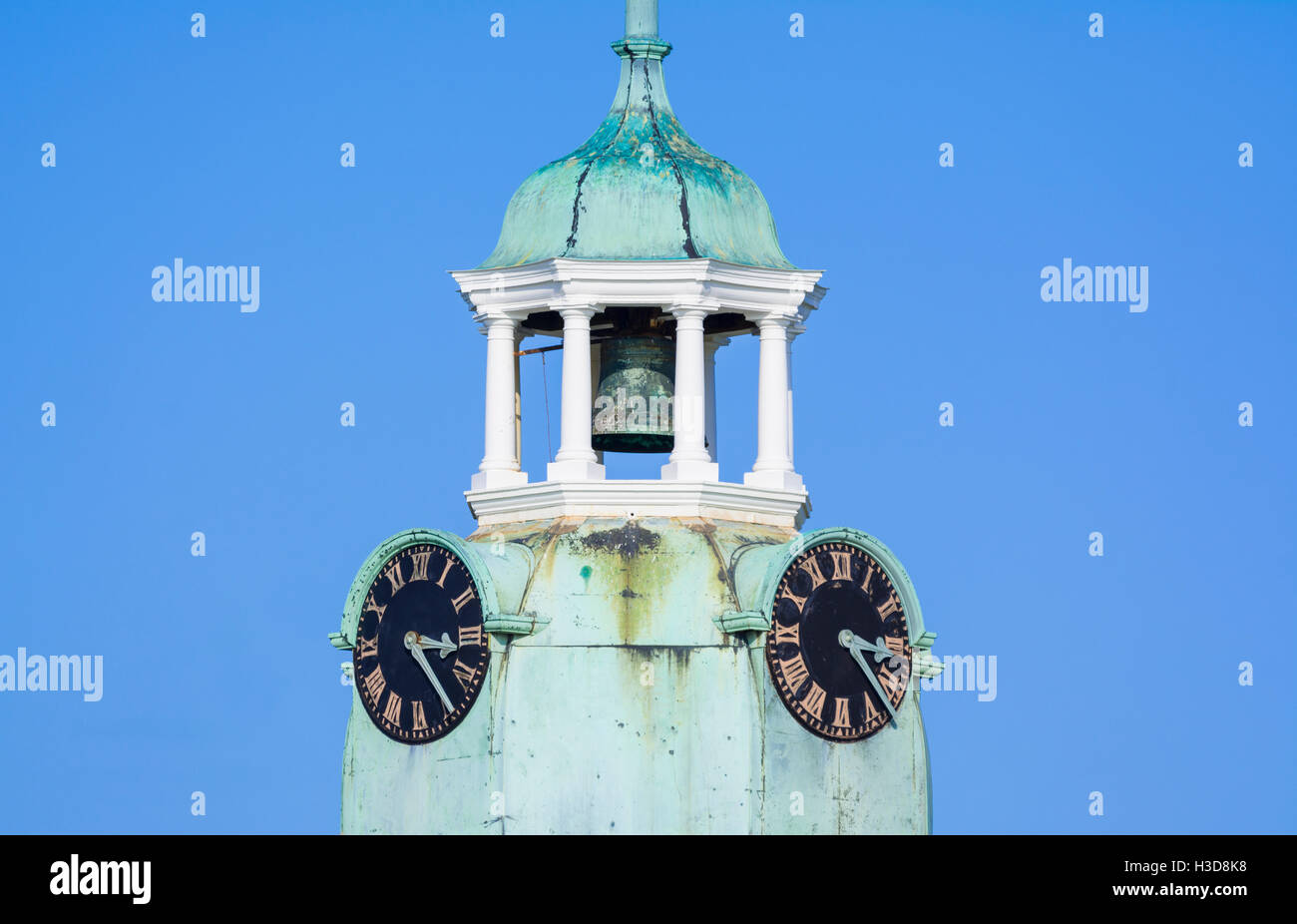 Clock Tower with bell at the stop of an old building in the UK. Bell tower. Clock tower bell. Stock Photo