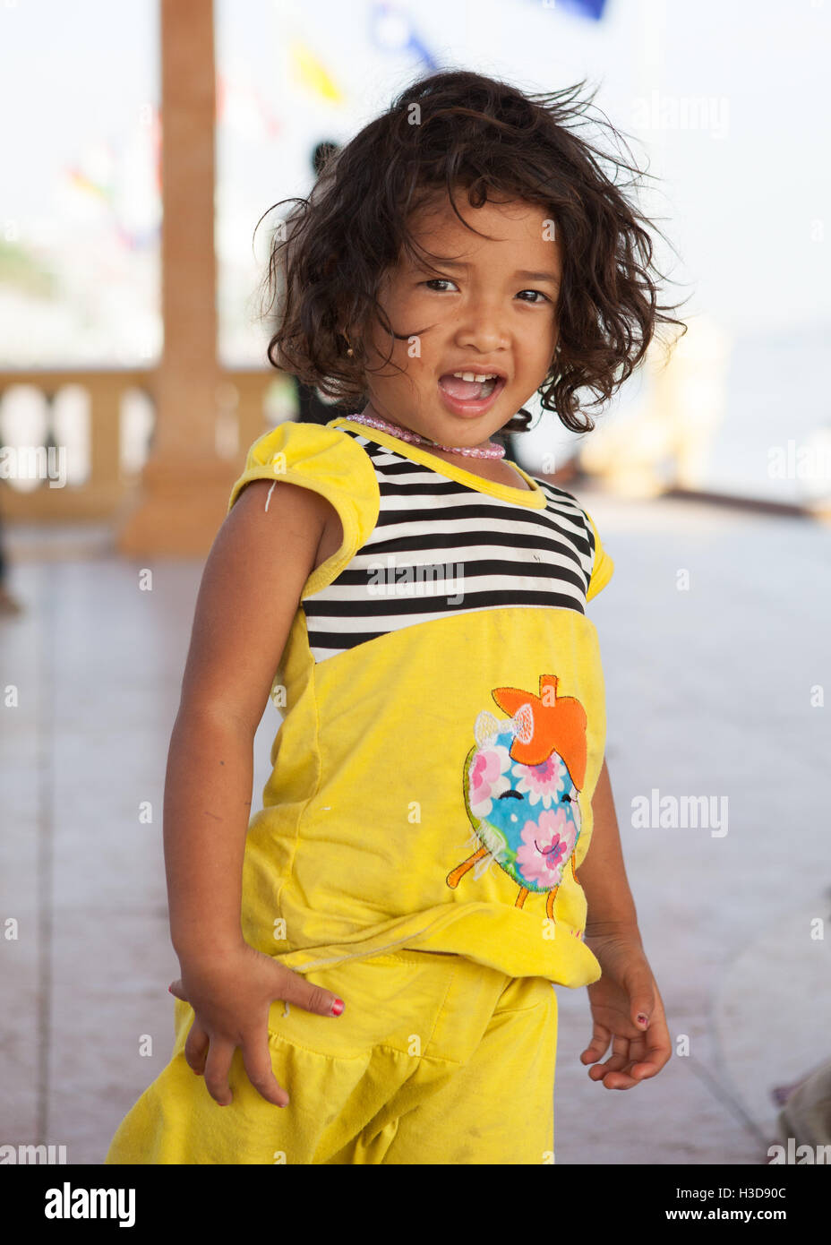 Street child on Sisowath Quay in Phnom Penh,Cambodia. Stock Photo