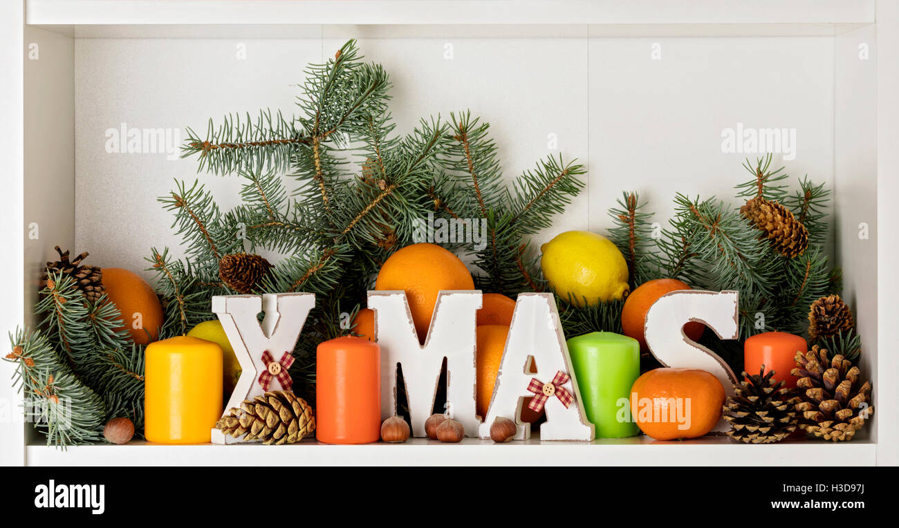 Merry Christmas! Wooden letters XMAS on the background of fir branches ...
