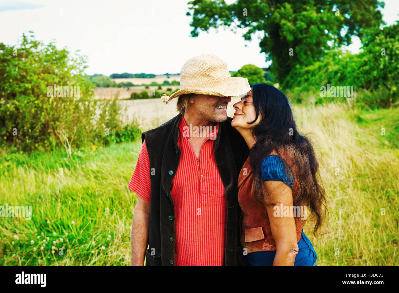 A man and woman kissing and hugging. Stock Photo