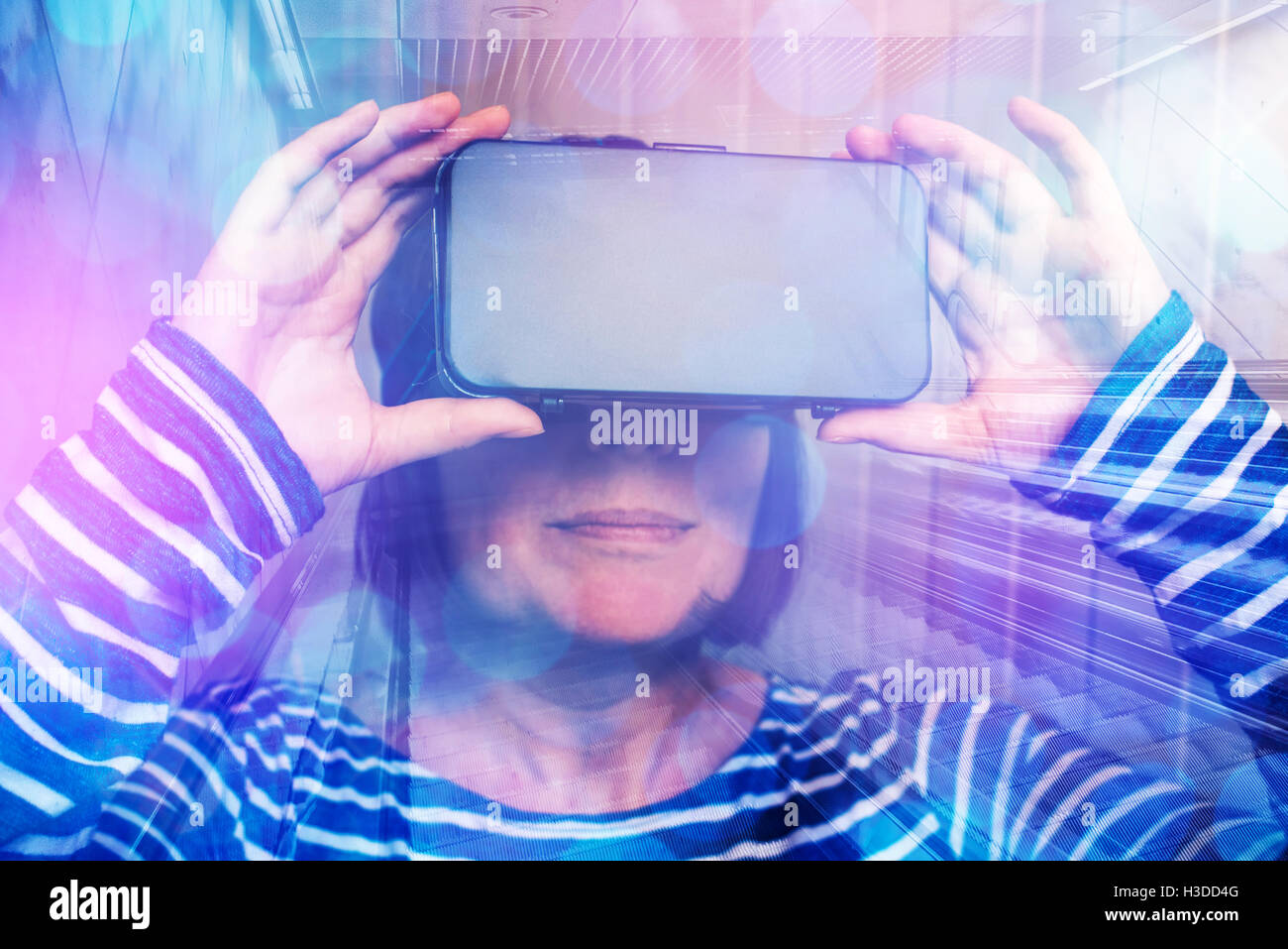 Woman watching 360 video with virtual reality headset. Female using VR