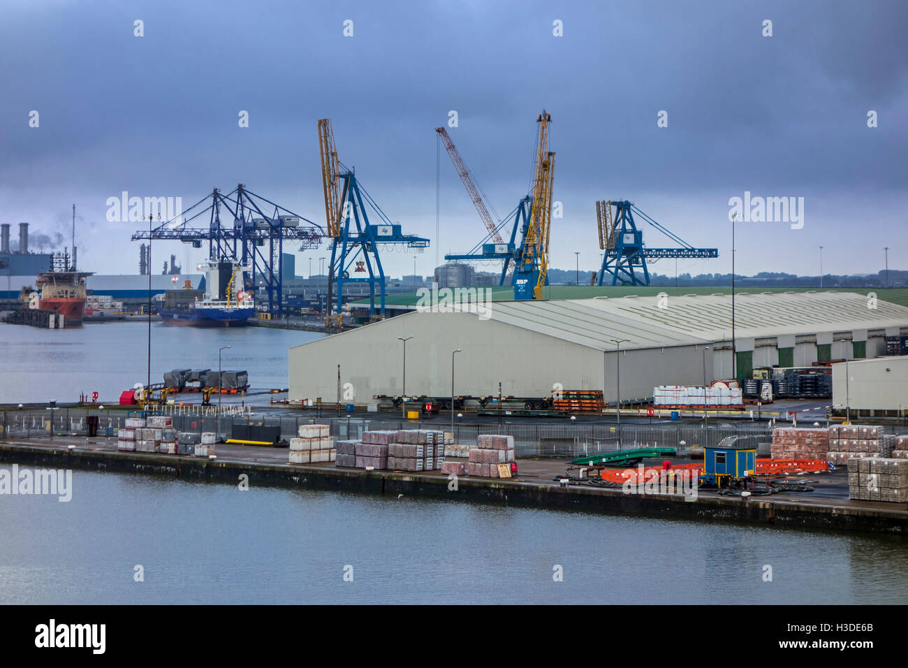 Warehouse and harbour cranes along dock in the port of Hull at Kingston