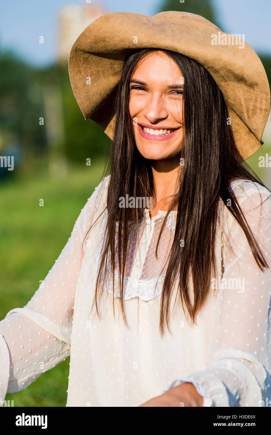 Woman with hat hi-res stock photography and images - Alamy