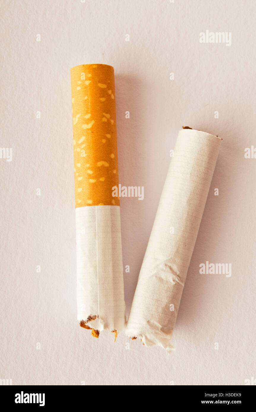 cigarette broken in half Stock Photo