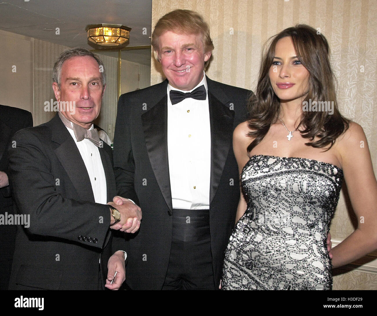 Mayor Michael Bloomberg (Republican of New York) welcomes Donald Trump and Melania Knauss to his hospitality suite prior to the White House Correspondents Association Dinner at the Washington Hilton Hotel in Washington, DC on April 28, 2001. Credit: Ron S Stock Photo