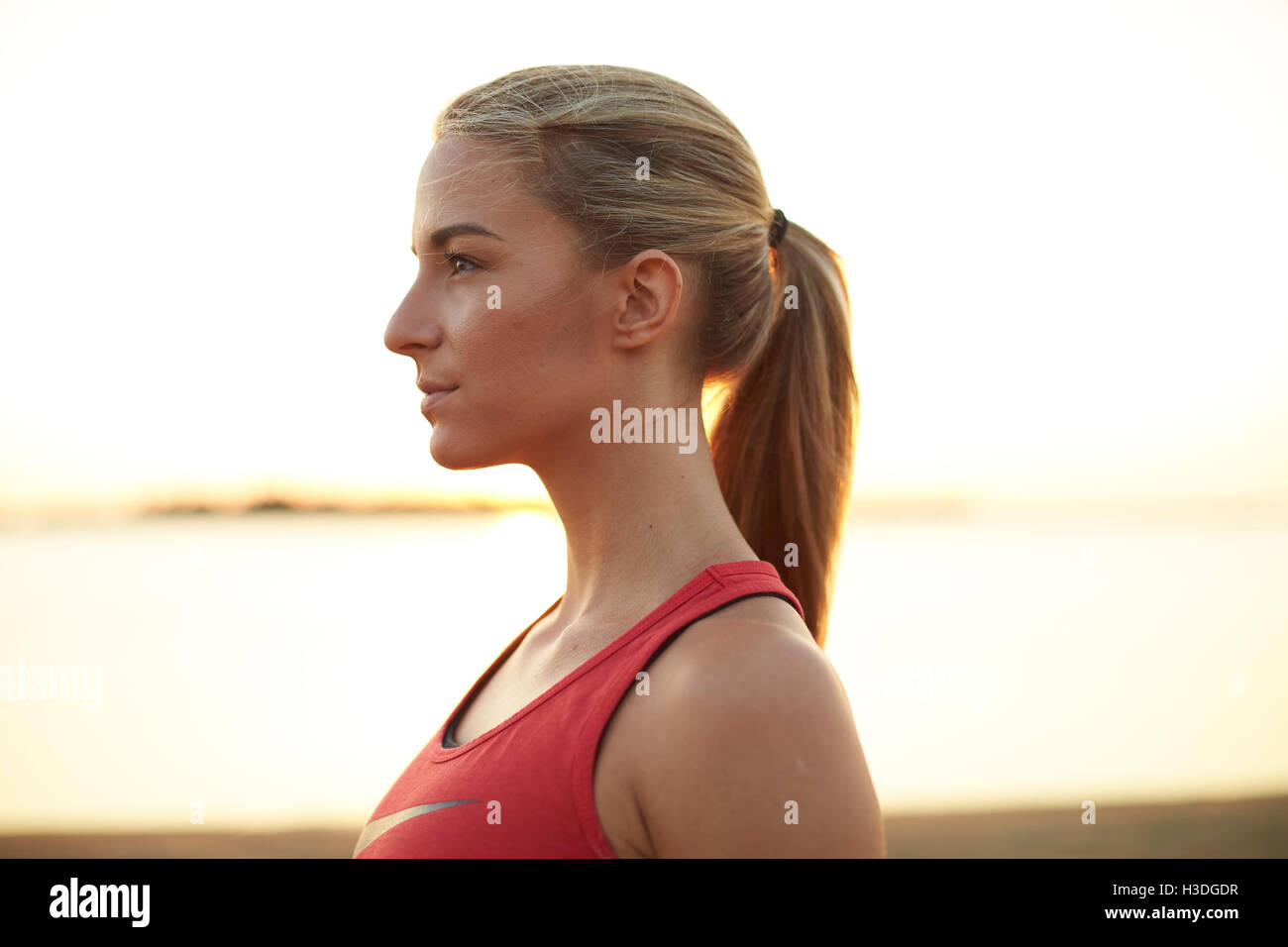 Portrait of a young athletic woman Stock Photo - Alamy