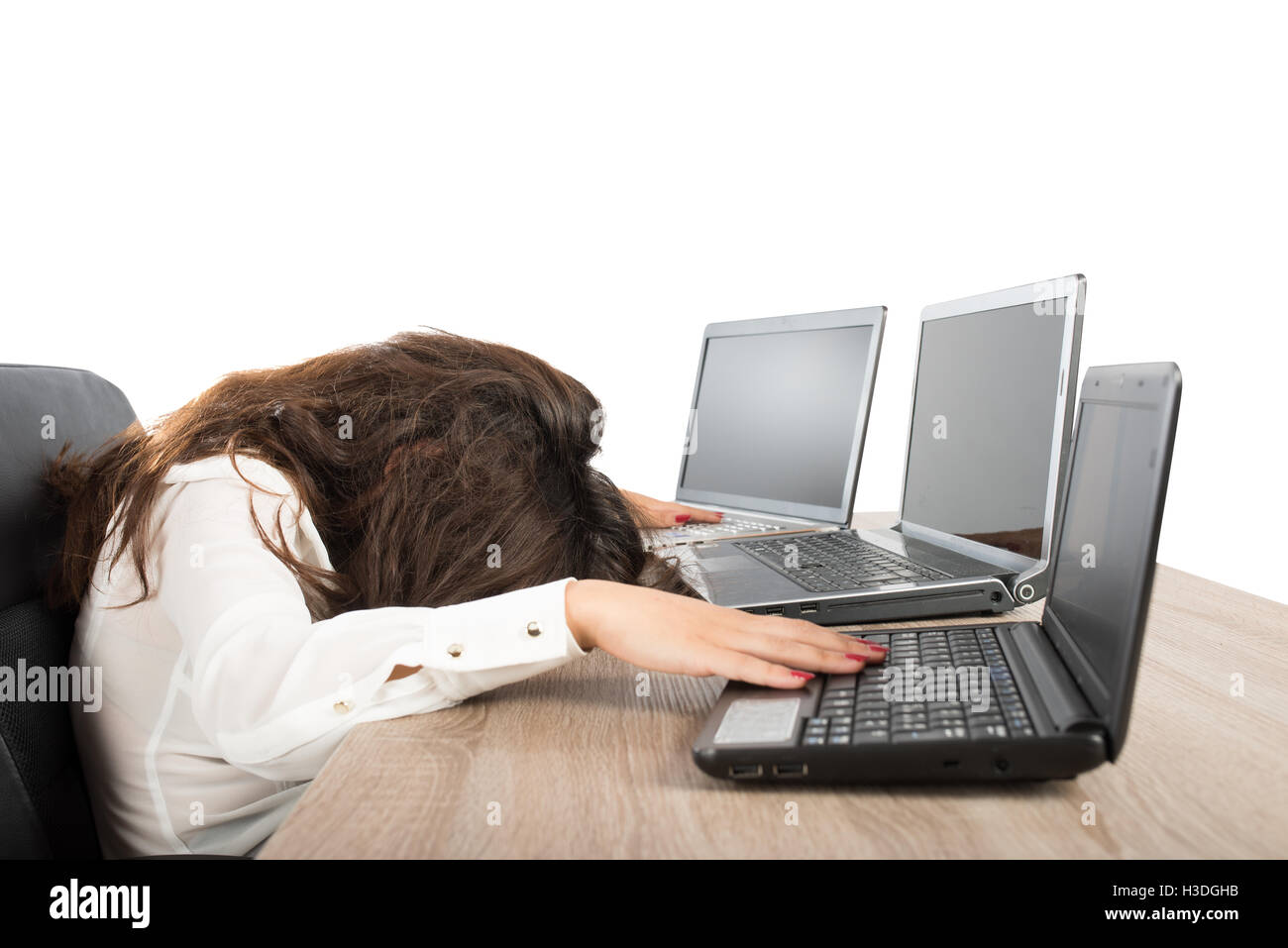 Stressed businesswoman due to overwork Stock Photo