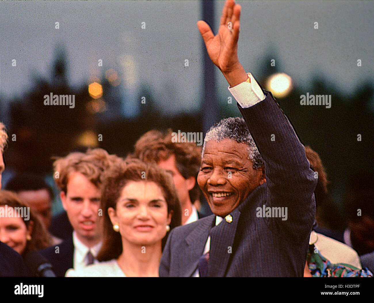 Boston, Massachusetts, USA. 23rd June, 1990. Nelson Mandela at the Kennedy Library in Boston during his first visit to the USA after being release from 26 years in prison on Robbins Island in S.Africa. Standing next to him J. Kennedy-Onassis and other members of the Kennedy family. © Kenneth Martin/ZUMA Wire/Alamy Live News Stock Photo