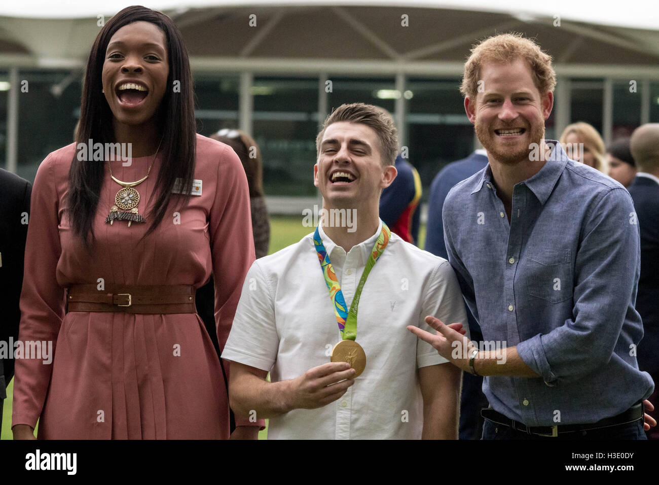 London, UK. 7th October, 2016. Prince Harry attends Lord's Cricket Club to mark the expansion of the Coach Core sports coaching apprenticeship programme. Harry poses with England netball champion, Eboni Beckford-Chambers(L), and Max Whitlock(centre) gold medalist winner from Rio 2016 Olympics in gymnastics floor and pommel horse Credit:  Guy Corbishley/Alamy Live News Stock Photo