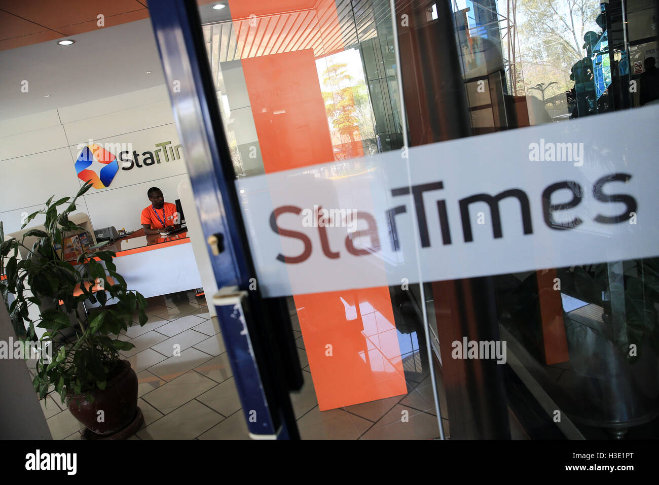 Nairobi, Kenya. 7th Oct, 2016. A staff member works at Startimes shop in Nairobi, capital of Kenya, on Oct. 7, 2016. StarTimes, a Chinese pay TV provider, operates in 16 African countries with over 8 million African subscribers. © Pan Siwei/Xinhua/Alamy Live News Stock Photo