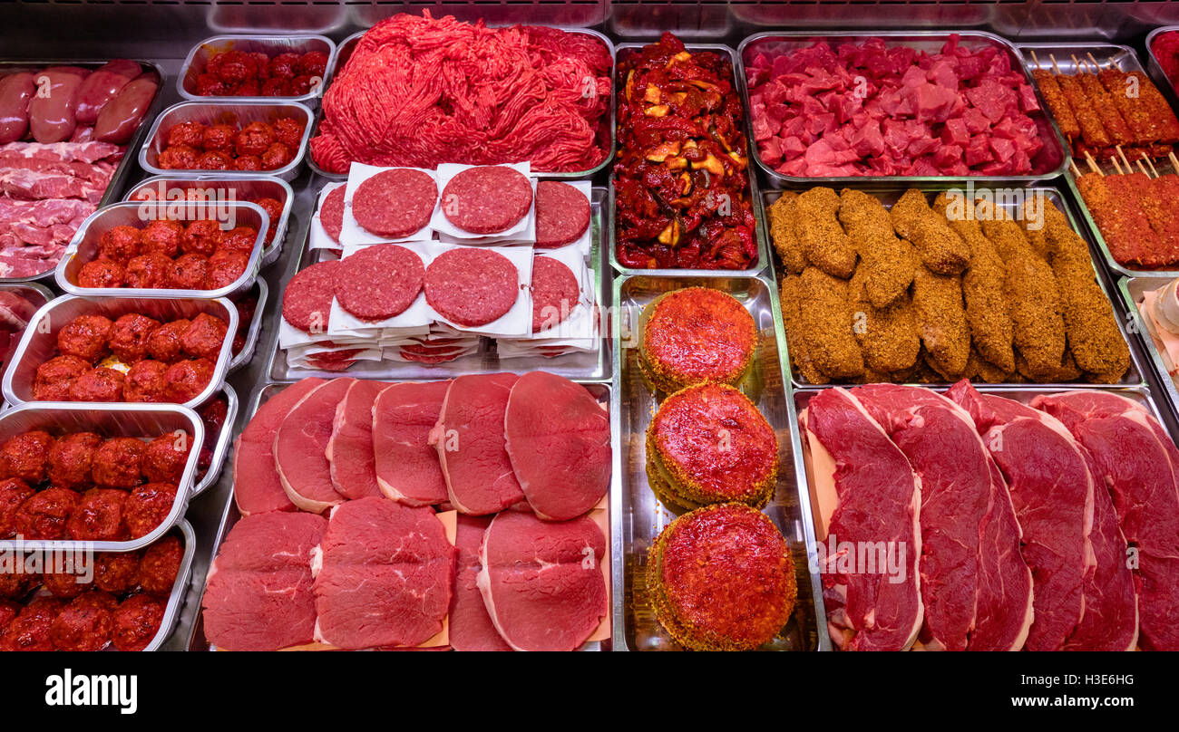 Variety of marinated meat at display counter Stock Photo Alamy