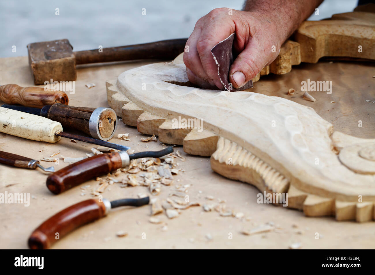 a wood carvings, tools and processes work closeup Stock Photo Alamy
