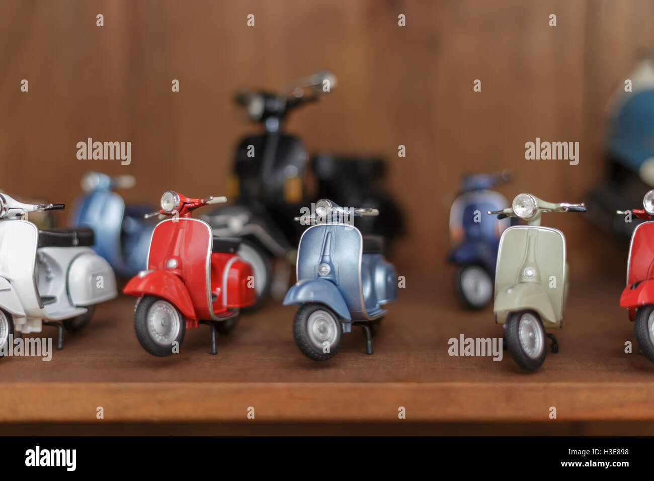 Collection of miniature toy scooters Stock Photo