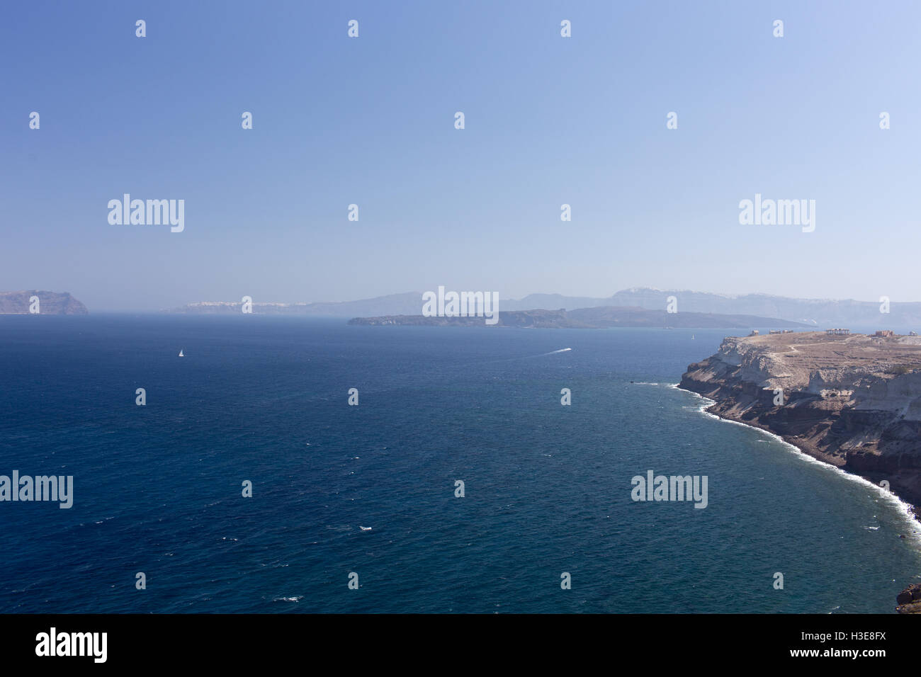 The calm sea in the background of the mountains Stock Photo - Alamy