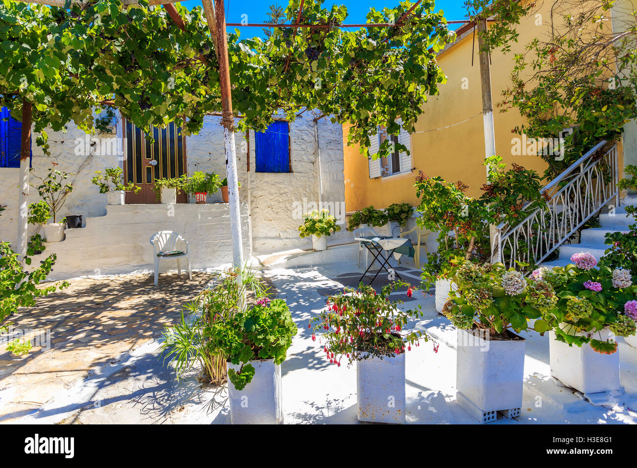 traditional greek village house and patio Stock Photo Alamy