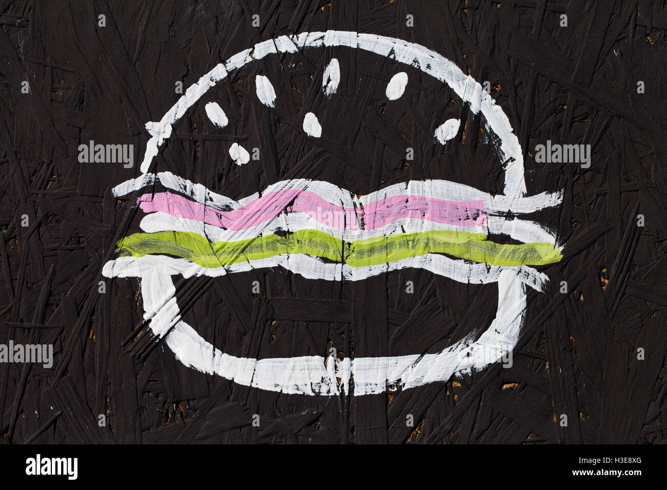a hamburger and cheeseburger, abstract pattern on a black background Stock Photo
