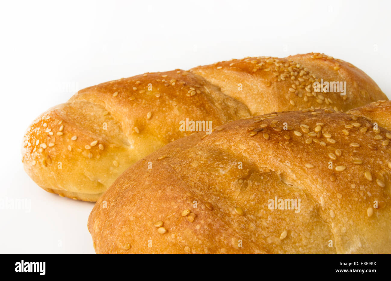 whole wheat breads on a white background Stock Photo - Alamy
