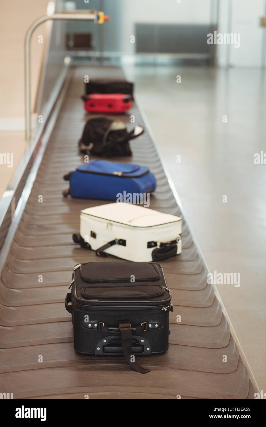 Luggage on the baggage carousel Stock Photo