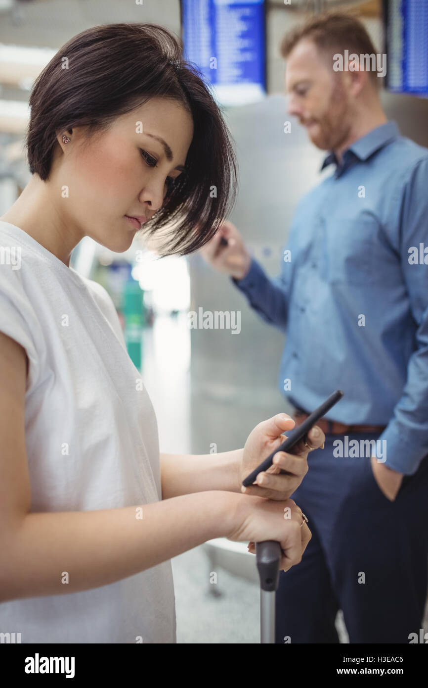 Business people using mobile phone Stock Photo