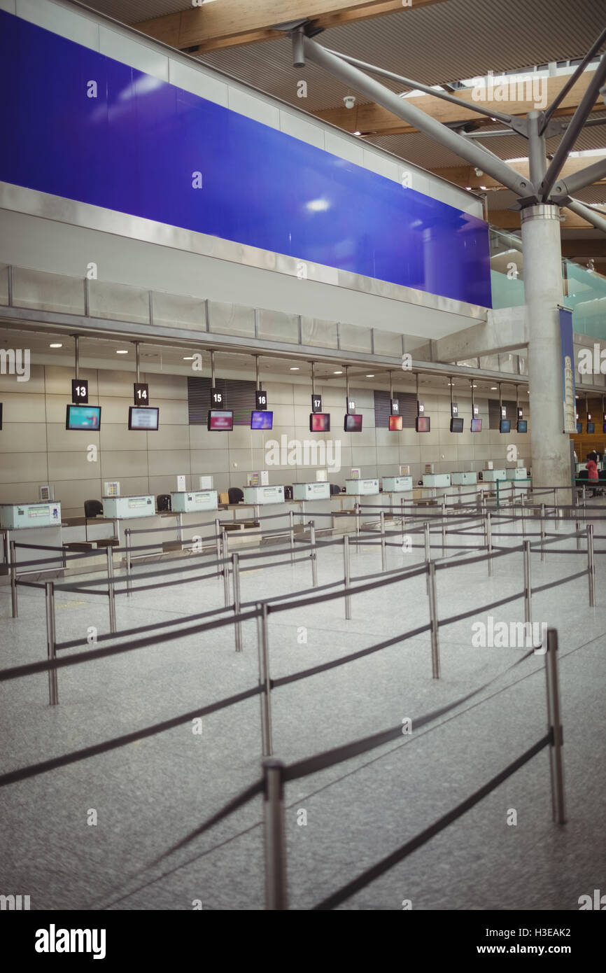 Empty check-in counters Stock Photo