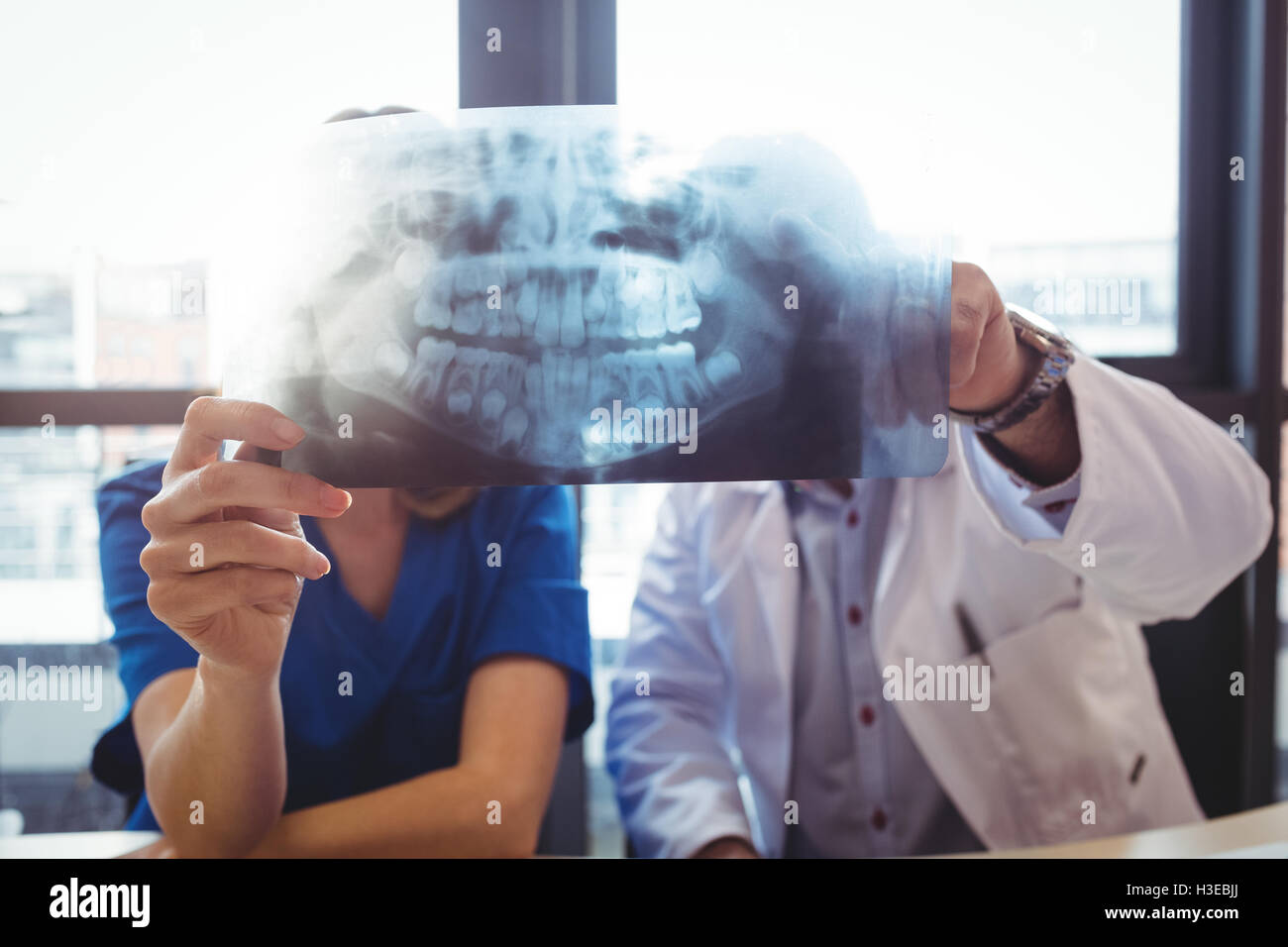 Doctor and nurse examining x-ray Stock Photo