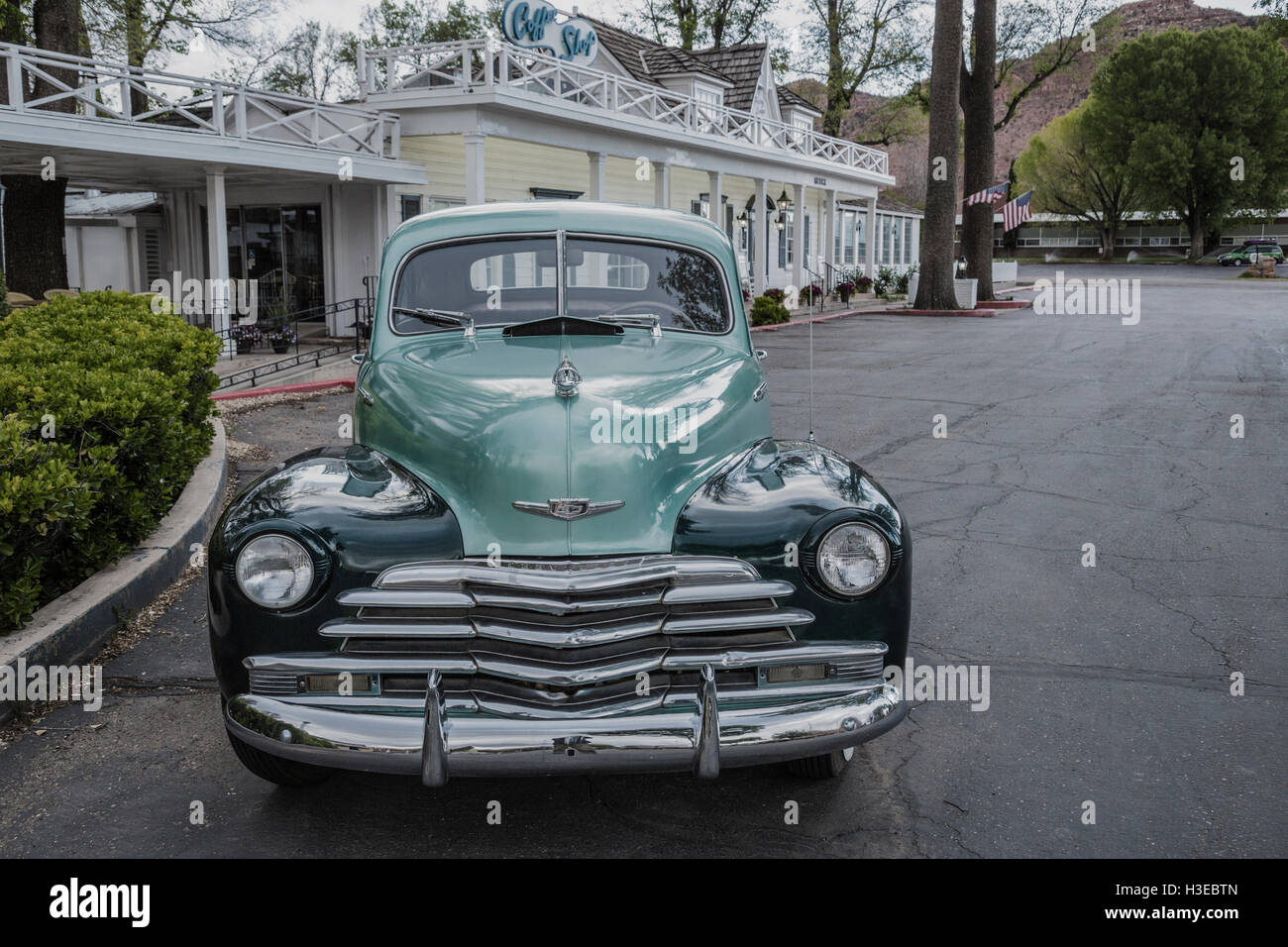 A !940's Chevrolet coupe automobile parked in a driveway in town of Kanab Utah USA Stock Photo