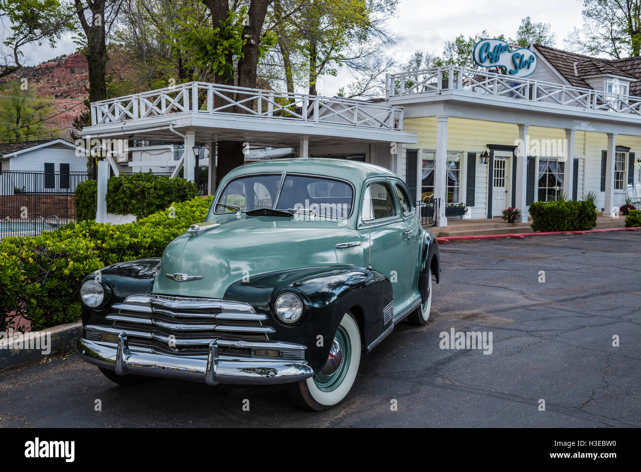 A !940's Chevrolet coupe automobile parked in a driveway in town of Kanab Utah USA Stock Photo