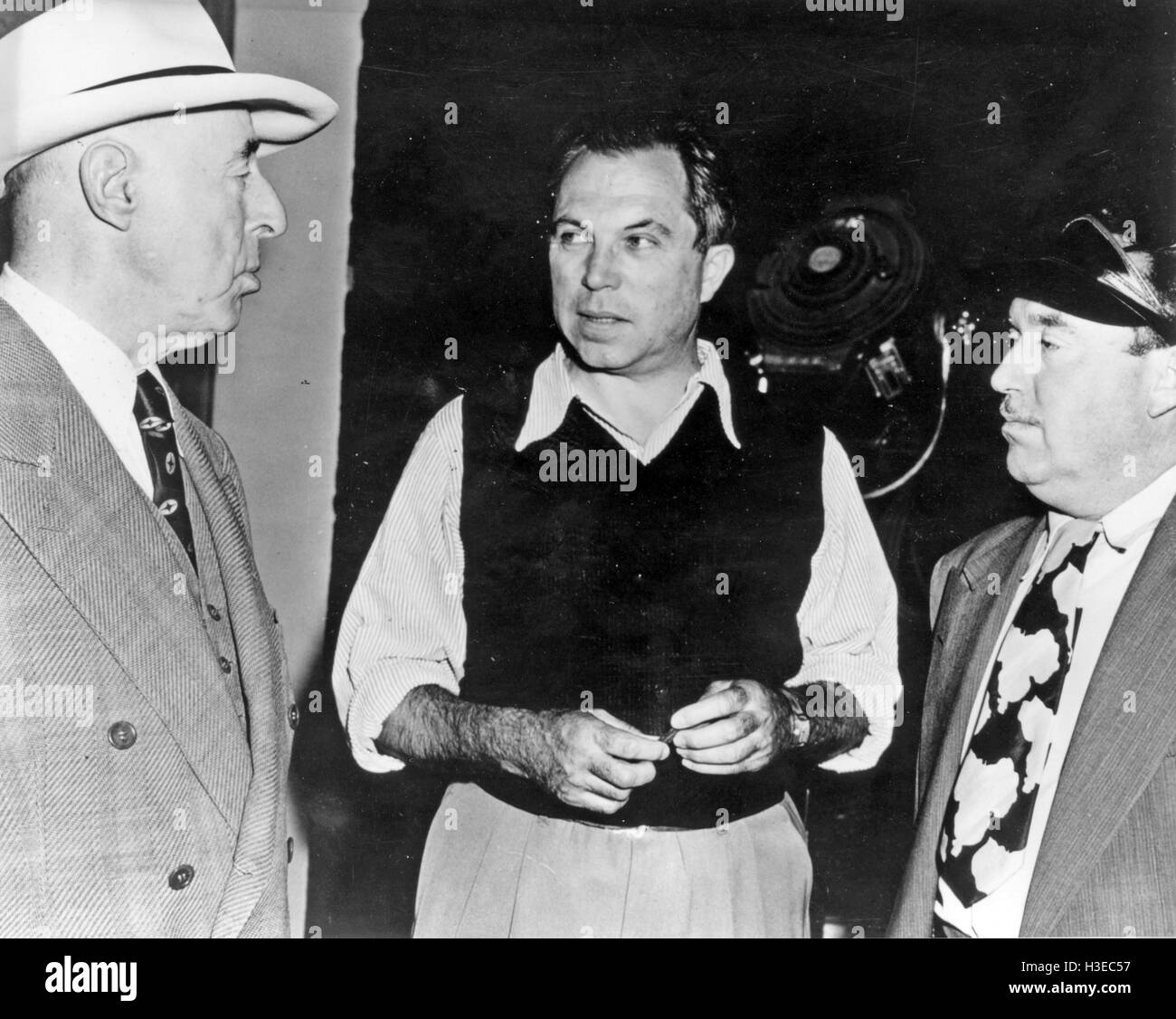 D.W.GRIFFITH at left about 1945 with fellow US film producers King Vidor centre and Lee Garmes who founded Pictorial Press in 1938 Stock Photo