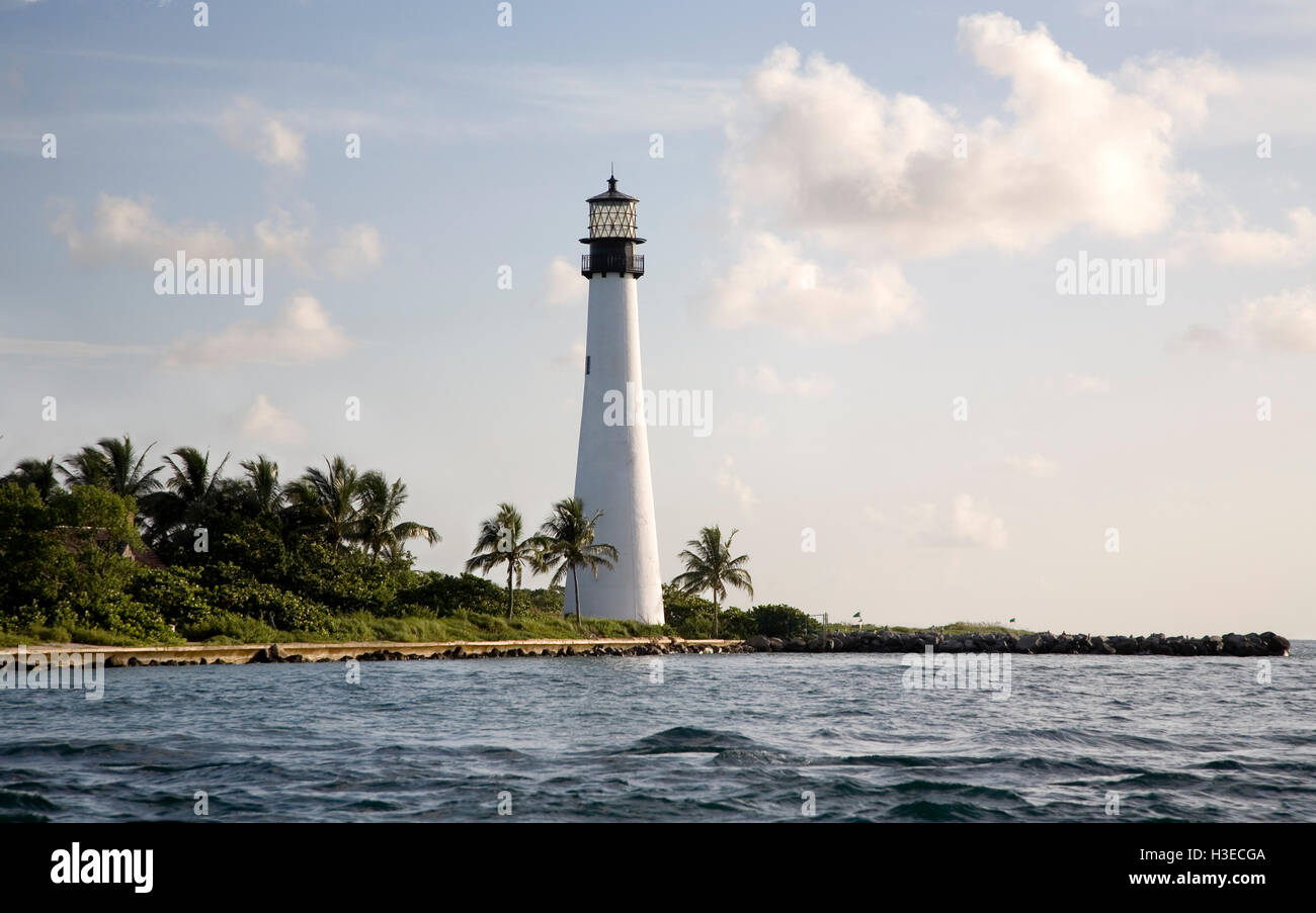 Cape Florida Light as viewed from the Biscayne Channel on a sultry summer's day, the image taken from a boat. Stock Photo