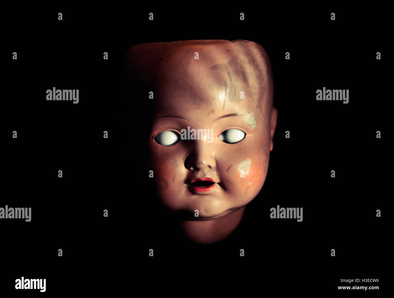Creepy doll face Stock Photo