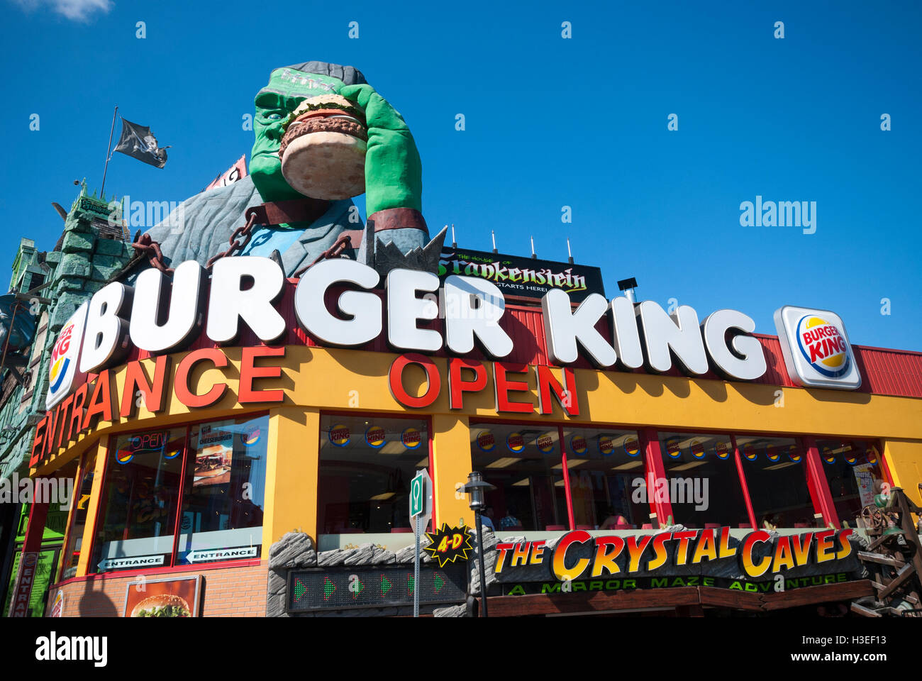 A bizarre Burger King restaurant franchise with Frankenstein holding a burger on Clifton Hill in Niagara Falls Canada Stock Photo