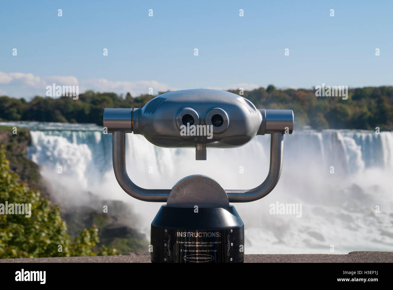 Coin operated binoculars for viewing the American Falls and other objects from the Canadian side of Niagara Falls Stock Photo