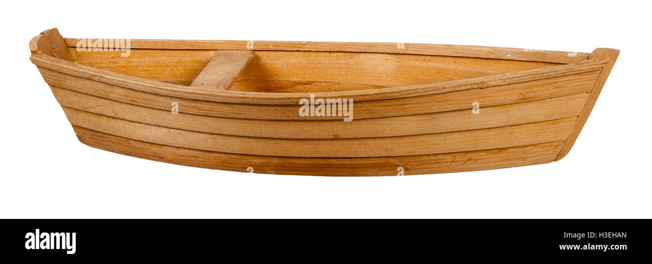 Wooden boat with a bench in the middle of the boat - path included Stock Photo