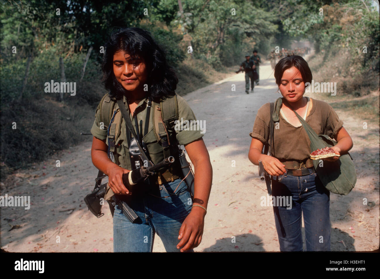 TENANCINGO,  EL SALVADOR, FEB 1984: - Within the FPL Guerrilla's Zones of Control - Some of the 1,000 guerillas that had been gathered in preparation for a guerrilla offensive, less than 40 miles from the capital, include woman combatants. Stock Photo