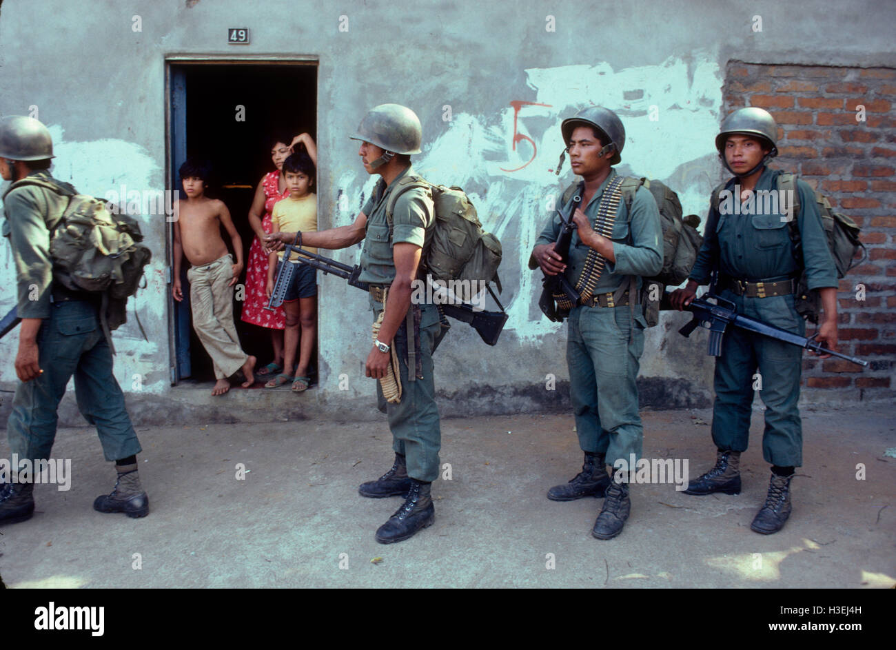 USULATAN, EL SALVADOR, MARCH 1982: U.S. trained and equipped Atlacatl Brigade of the Salvadoran army on patrol near Usulatan Stock Photo