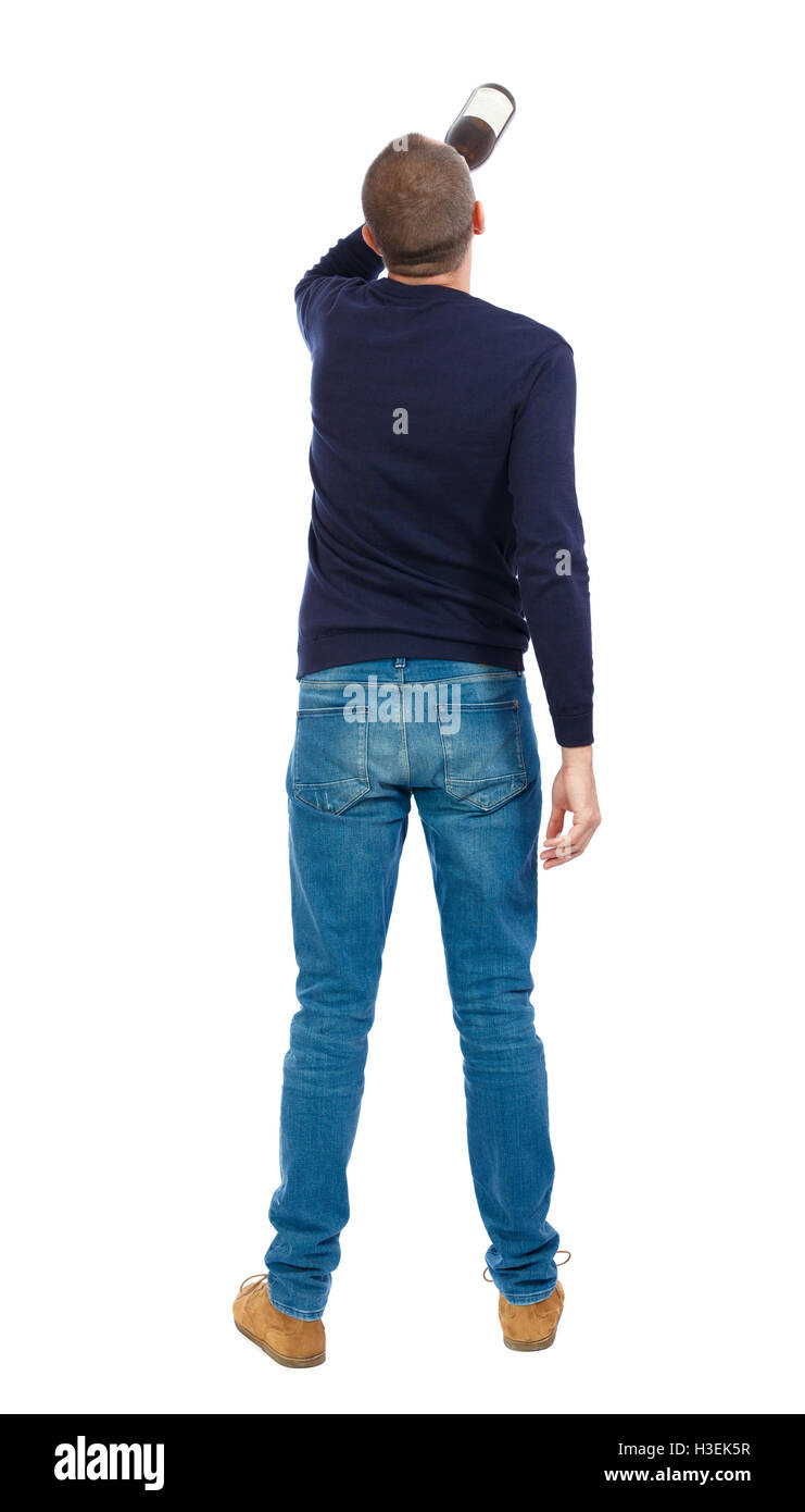 Back view of drunk man with bottle wine. drinking young guy Stock Photo