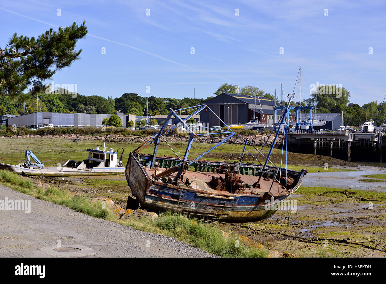 Port of Paimpol with wreck, a commune in the Côtes-d'Armor department in Brittany in northwestern France Stock Photo