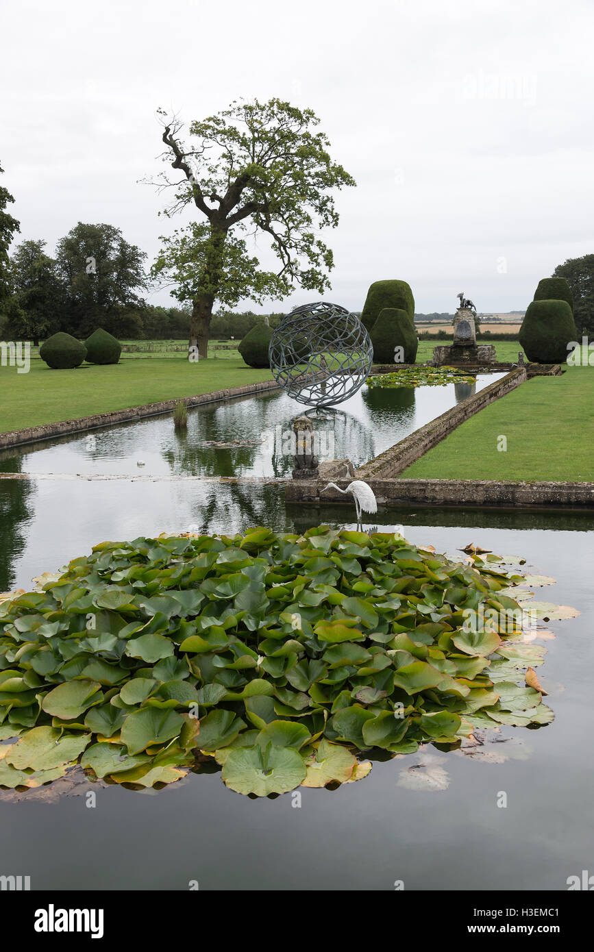 Part of the Beautiful Gardens at Burton Agnes Hall with the Classical Pond Water Feature near Driffield East Riding of Yorkshire England UK Stock Photo