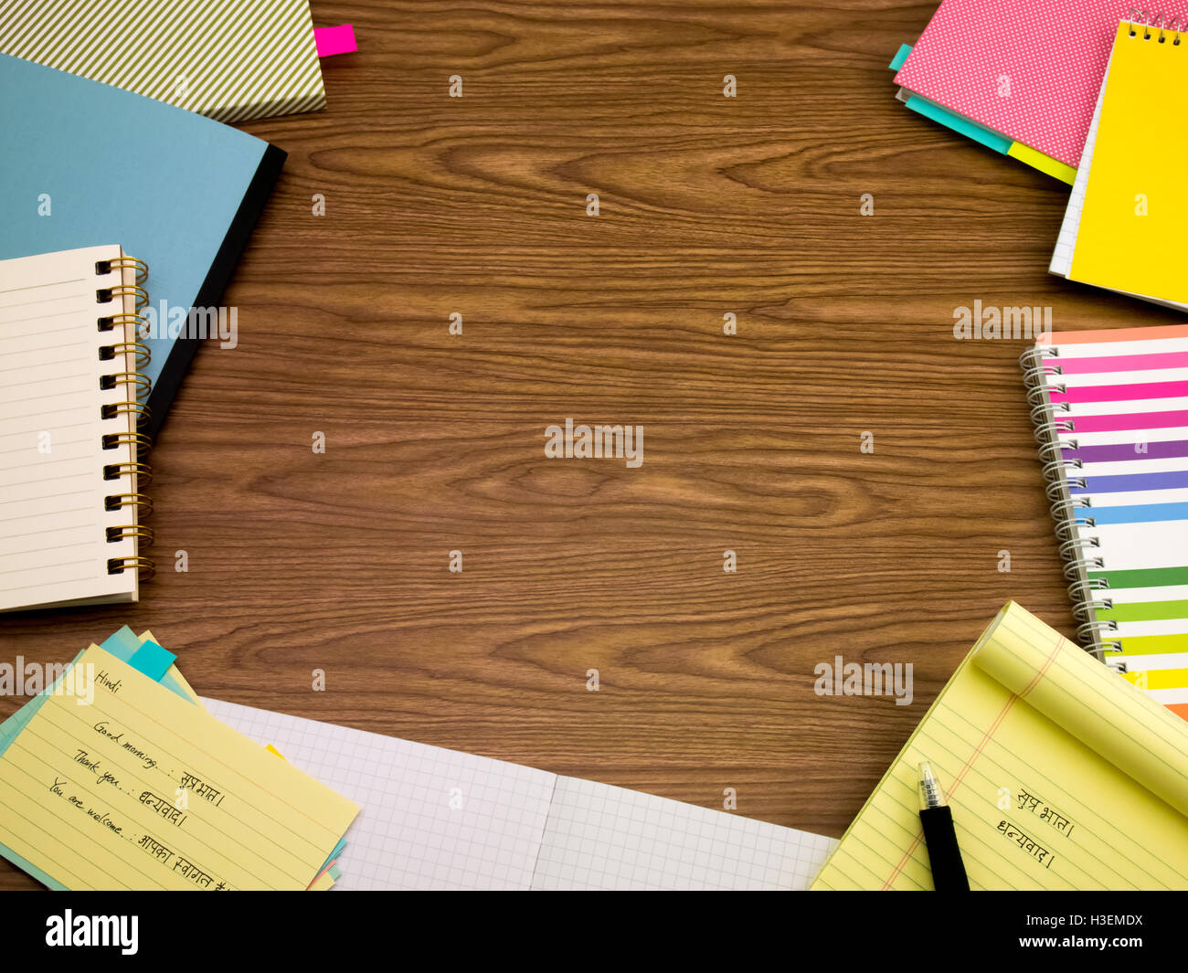 Hindi; Learning New Language Writing Words on the Notebook Stock Photo