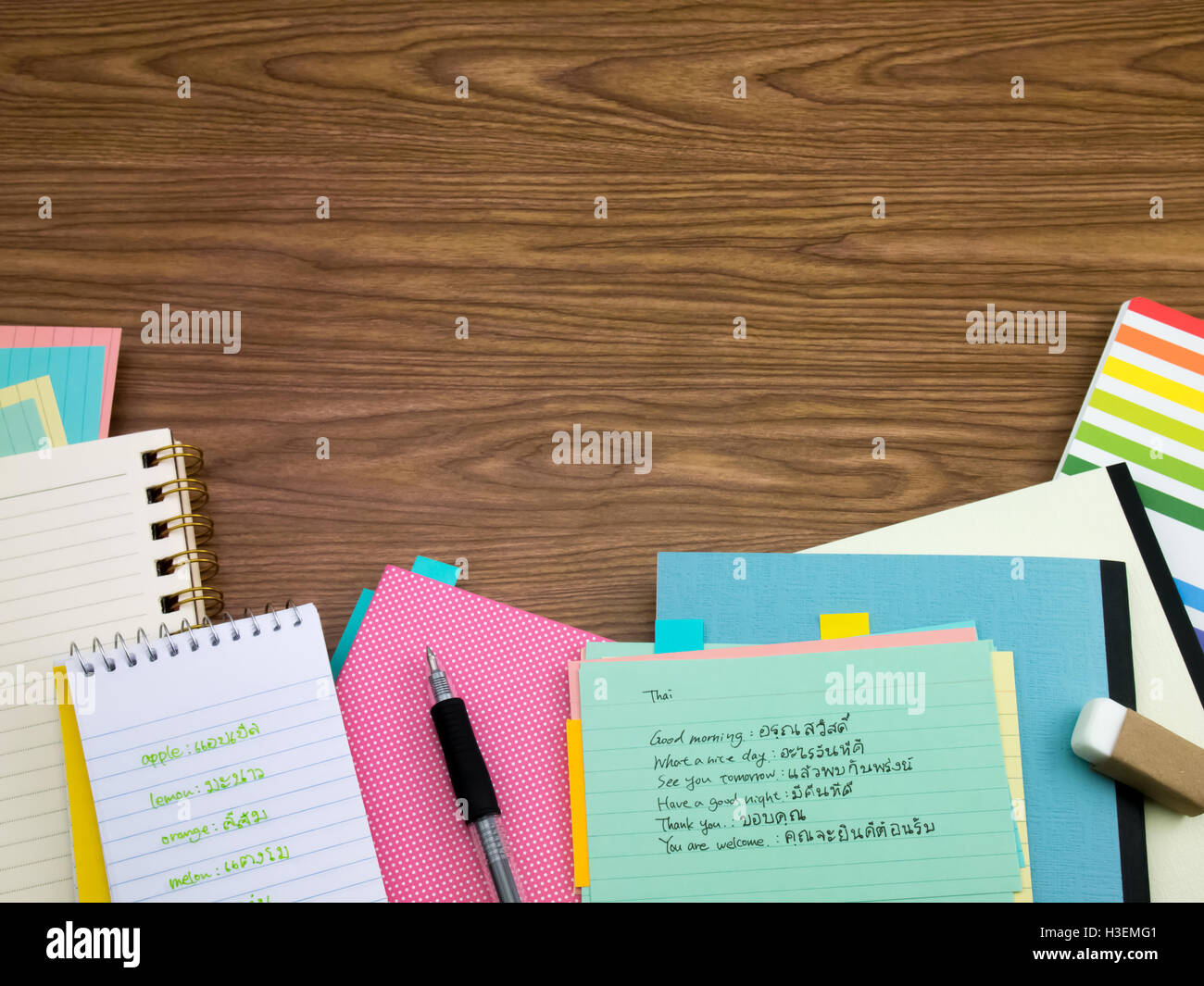 Thai; Learning New Language Writing Words on the Notebook Stock Photo