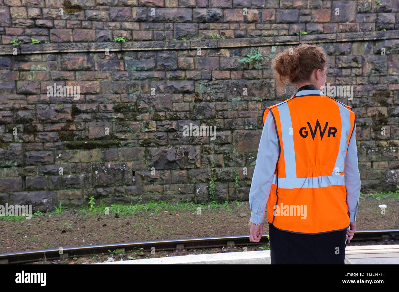 Train staff on platform Stock Photo Alamy