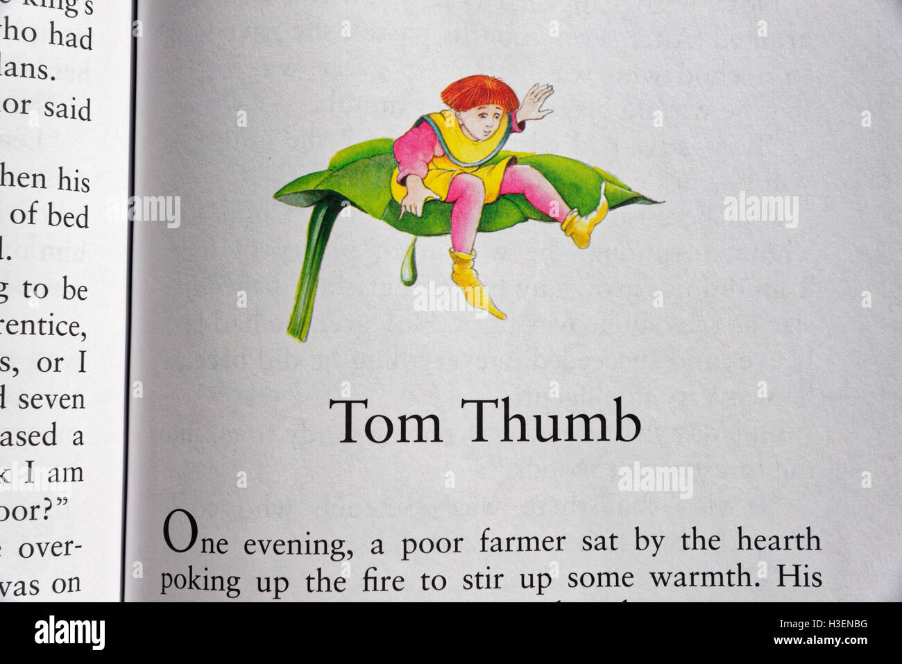 Tom Thumb in a book of Fairy Tales Stock Photo - Alamy