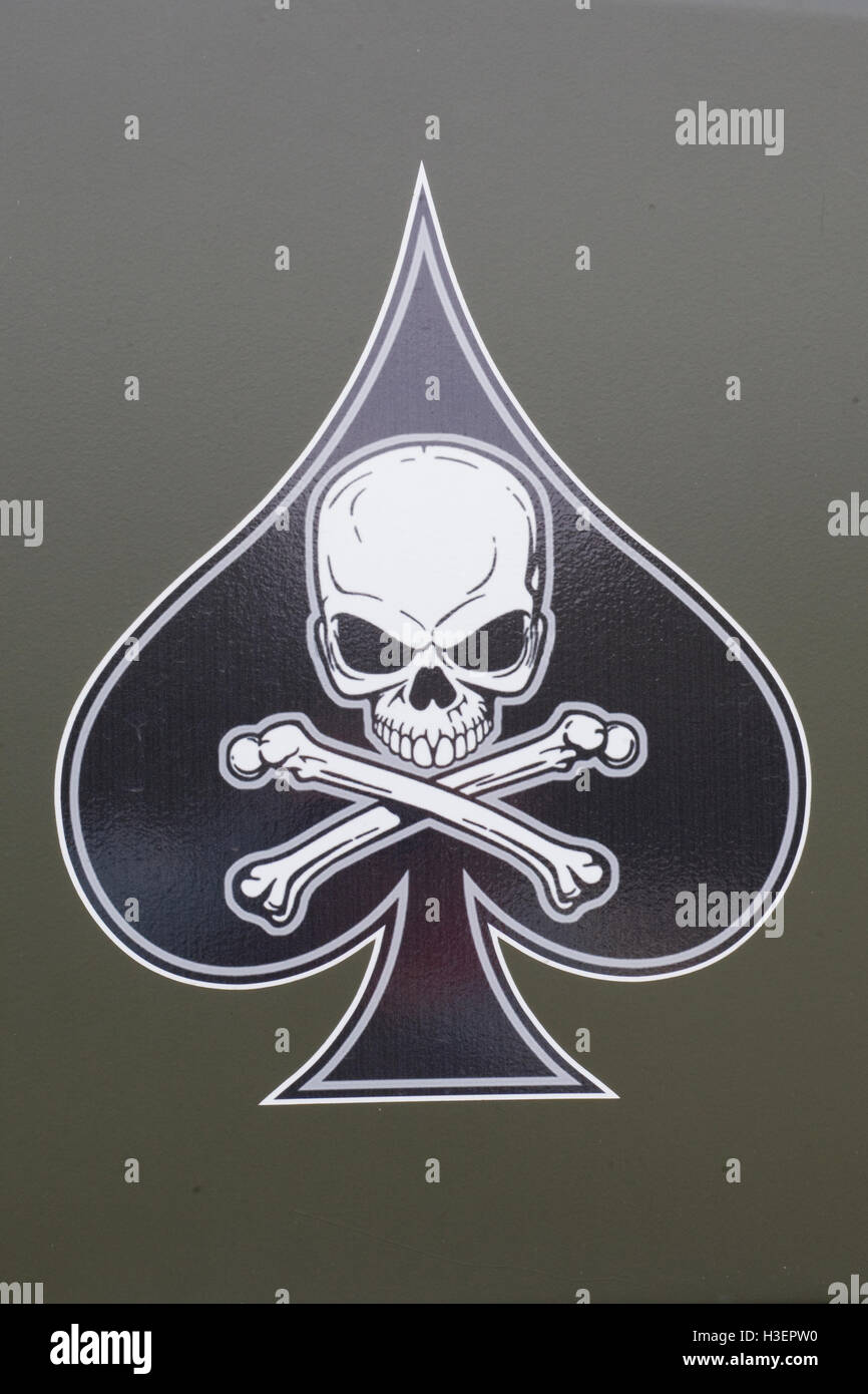 Skull and crossbones in the Ace of Spades on the side of a military