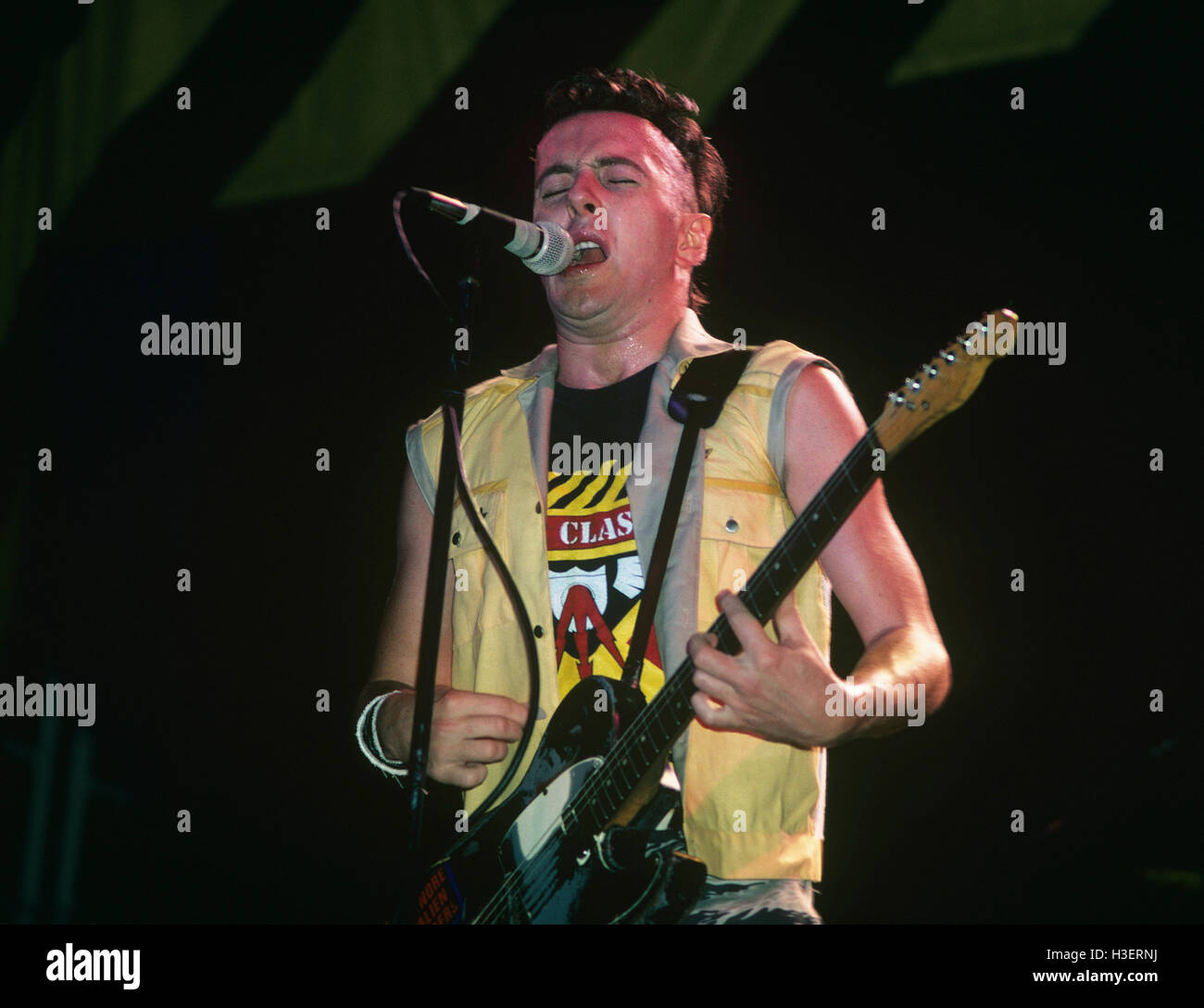 Joe Strummer from The Clash pictured performing.  © Gary  Gershoff / MediaPunch Stock Photo