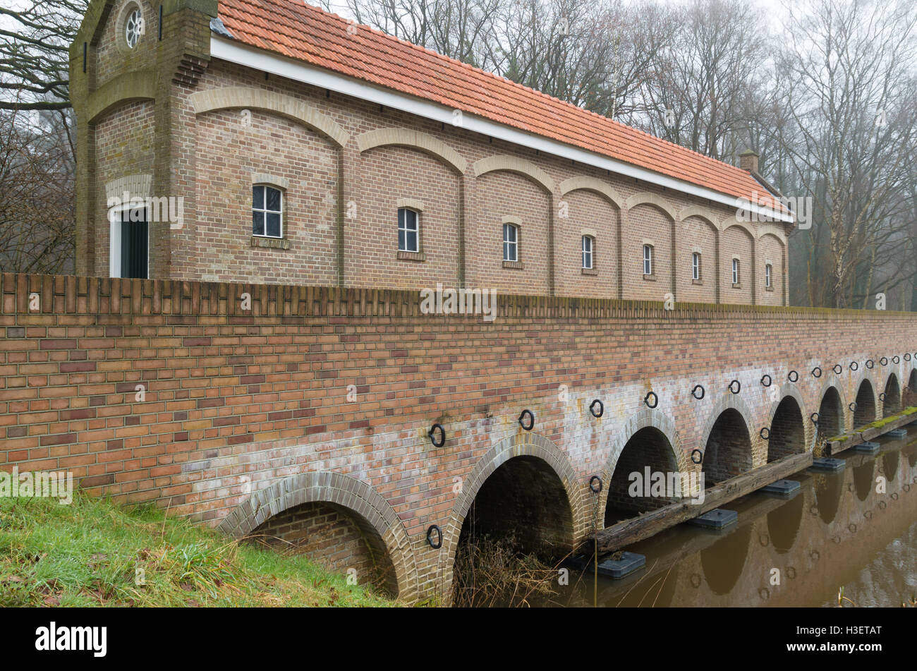 restored sluice house or Schuivenhuisje in dutch language along the